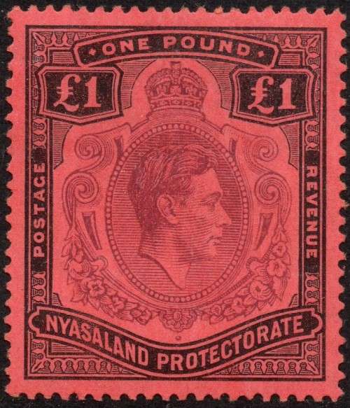 NYASALAND 1938-44  SG143 £1 PURPLE & BLACK ON RED - UM