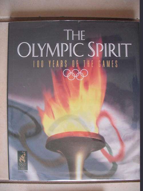 The Olympics: 100 Years Of The Games by Susan Wels (Atlanta 1996)