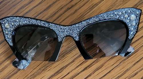 Miu Miu smu 02q Ladies Sunglasses. Made in Italy