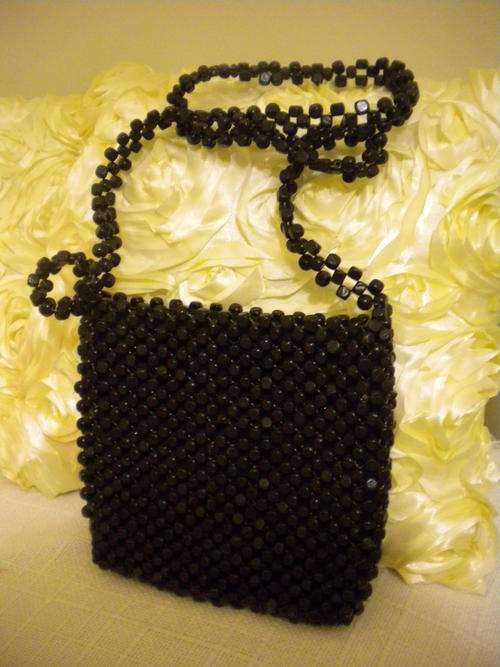Black wood beaded sling evening bag