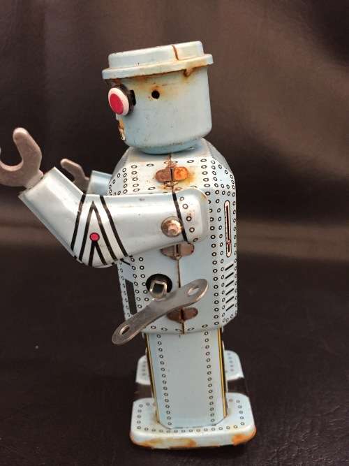 Tin metal wind up robots working bid for both!!!!