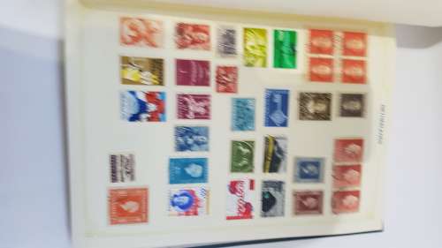 Large Stanley Gibbons stamp album full of stamps from all over the world!!!!!
