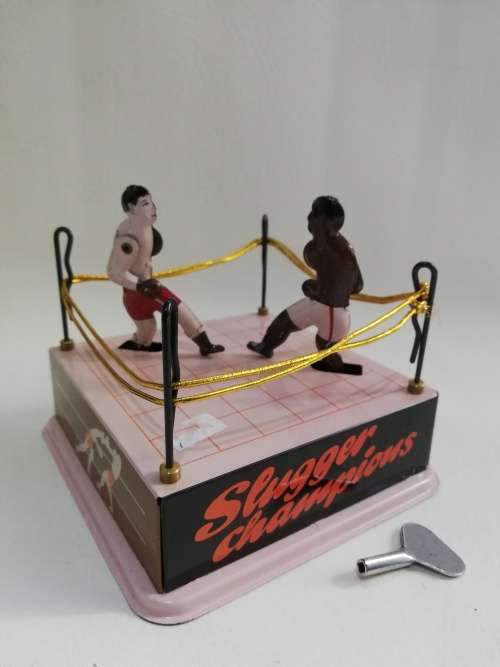 Rare mint condition Sluggers champion tin toy with key winds up working!!!!!!