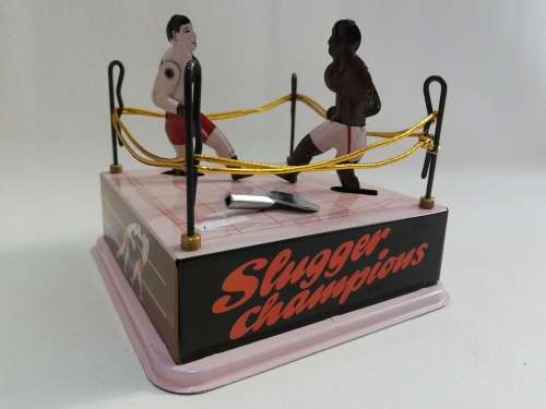 Rare mint condition Sluggers champion tin toy with key winds up working!!!!!!