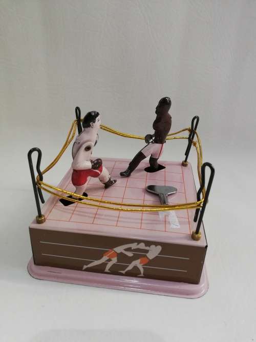 Rare mint condition Sluggers champion tin toy with key winds up working!!!!!!