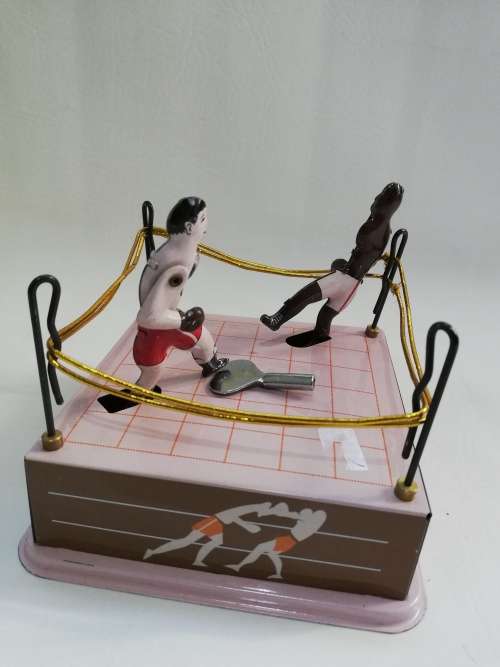 Rare mint condition Sluggers champion tin toy with key winds up working!!!!!!