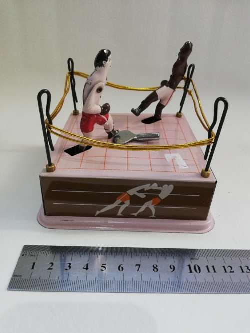 Rare mint condition Sluggers champion tin toy with key winds up working!!!!!!