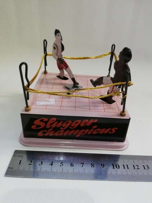 Rare mint condition Sluggers champion tin toy with key winds up working!!!!!!