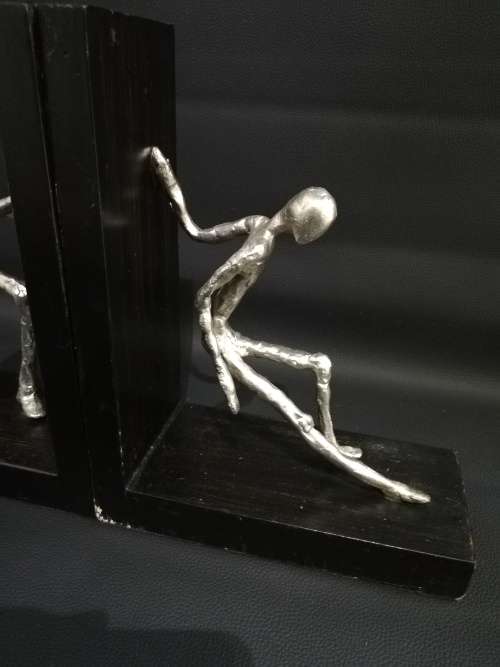 Two large metal Bookends bid for both!!!!