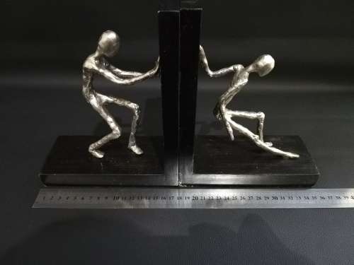 Two large metal Bookends bid for both!!!!