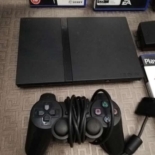 Sony Playstation 2 complete tested working 100% with four games!!!!