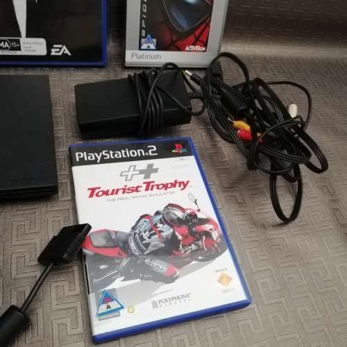 Sony Playstation 2 complete tested working 100% with four games!!!!