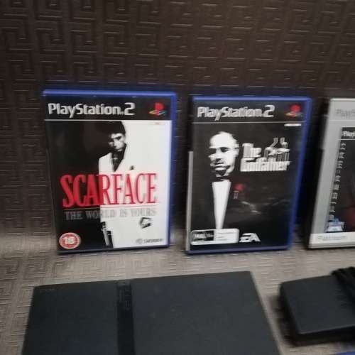Sony Playstation 2 complete tested working 100% with four games!!!!