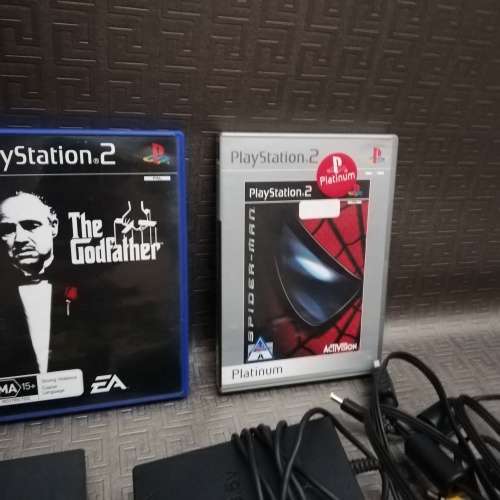 Sony Playstation 2 complete tested working 100% with four games!!!!