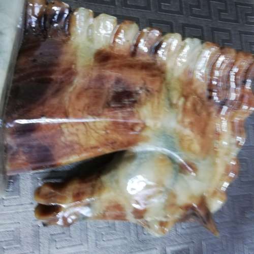 Two stunning marble horse bookends bid for both