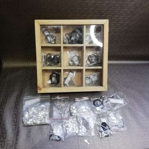 Wooden case with a large collection of necklaces and pieces bid for all!!!!