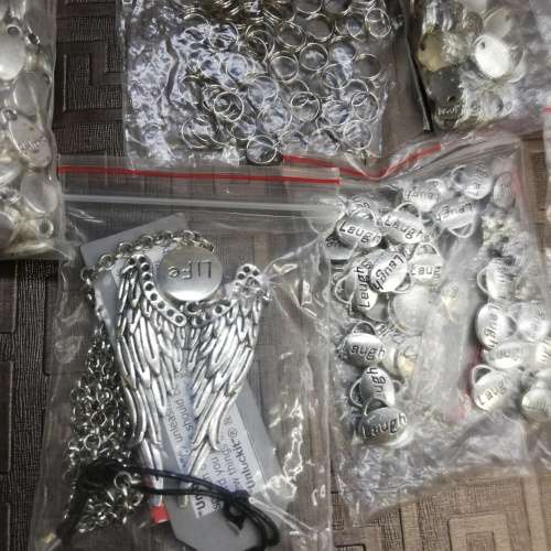 Wooden case with a large collection of necklaces and pieces bid for all!!!!