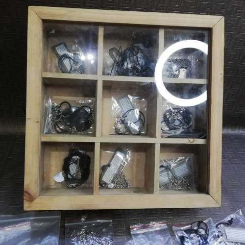 Wooden case with a large collection of necklaces and pieces bid for all!!!!