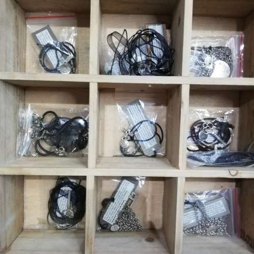 Wooden case with a large collection of necklaces and pieces bid for all!!!!
