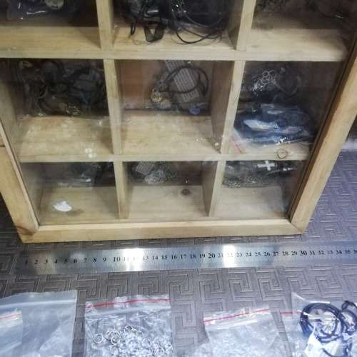 Wooden case with a large collection of necklaces and pieces bid for all!!!!