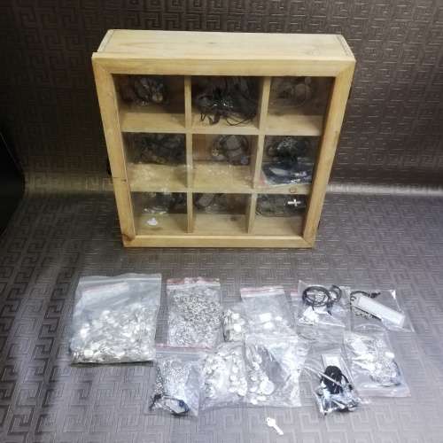 Wooden case with a large collection of necklaces and pieces bid for all!!!!