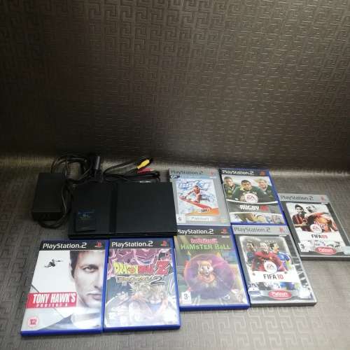 Vintage ps2 with 7 games ps2 goes on but does not read disks!!!!!