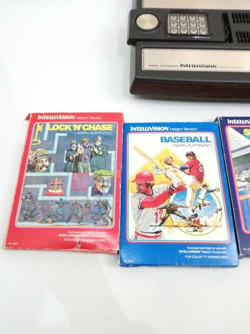 Rare intelivision console with boxed games working 100% compete!!!!