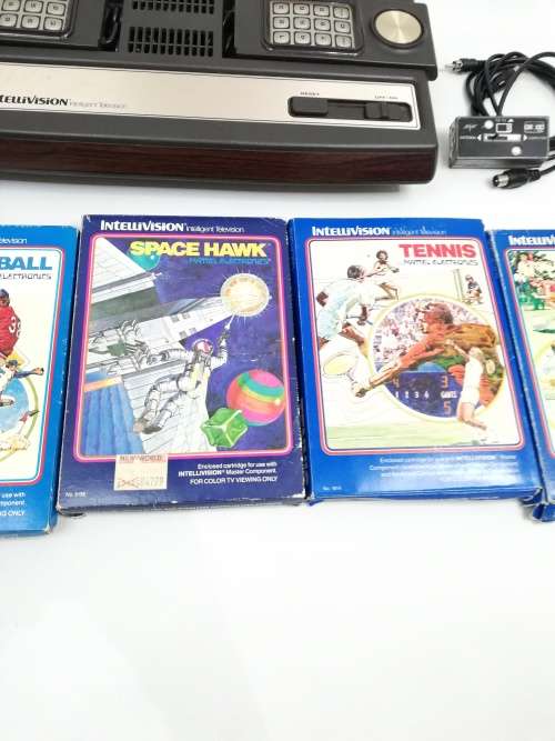 Rare intelivision console with boxed games working 100% compete!!!!