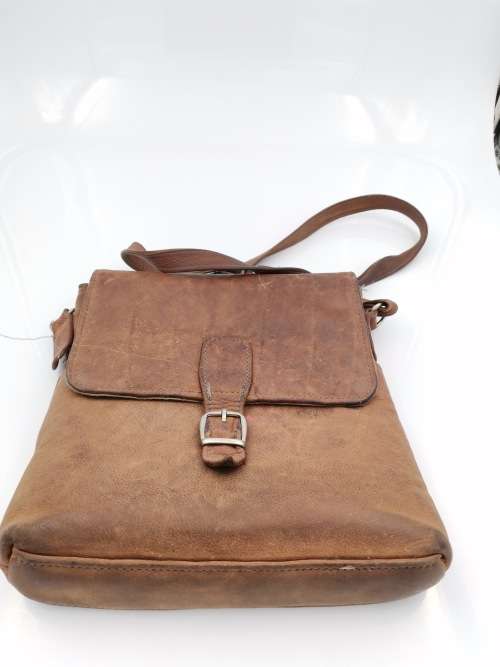 LEATHER BAG STRAPE NEEDS TO BE FIXED!!!