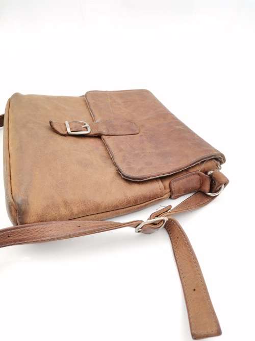 LEATHER BAG STRAPE NEEDS TO BE FIXED!!!