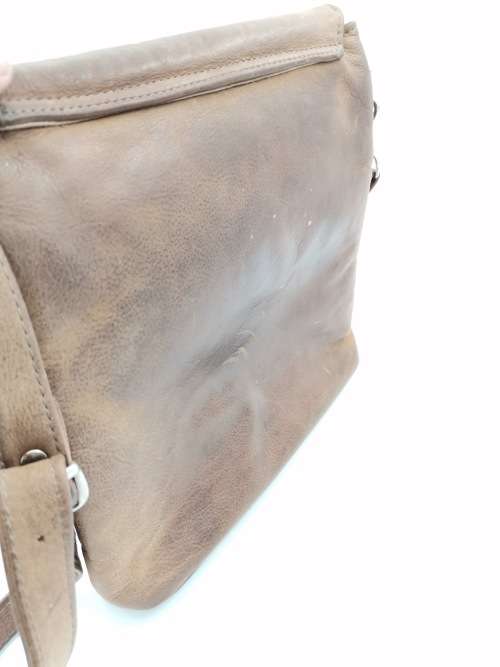 LEATHER BAG STRAPE NEEDS TO BE FIXED!!!