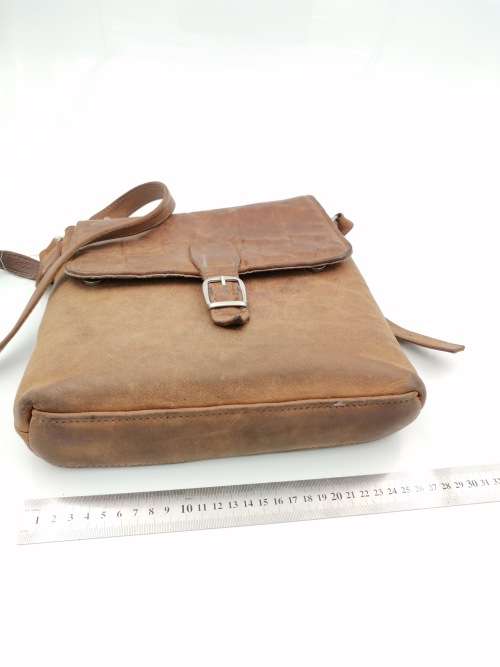 LEATHER BAG STRAPE NEEDS TO BE FIXED!!!