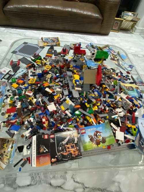 MASSIVE COLLECTION OF LEGOS IN BOX WITH MANUALS WEIGHT 9.65kg WITH CONTAINER BID FOR ALL !!!!