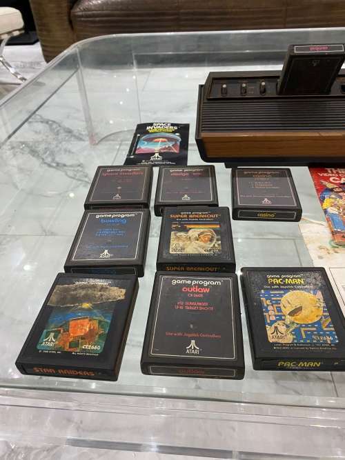VINTAGE ATARI 2600 COMPLETE TESTED AND WORKING WITH A WHOLE COLLECTION OF GAMES BID FOR ALL !!!!