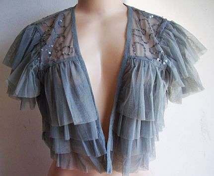 Net Shrug. Size 34
