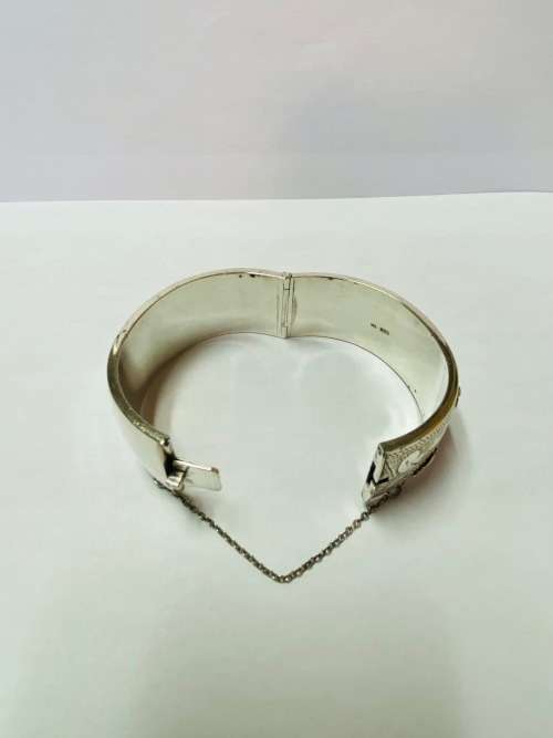 Beautiful Sterling Silver Victorian Style cuff with safety chain