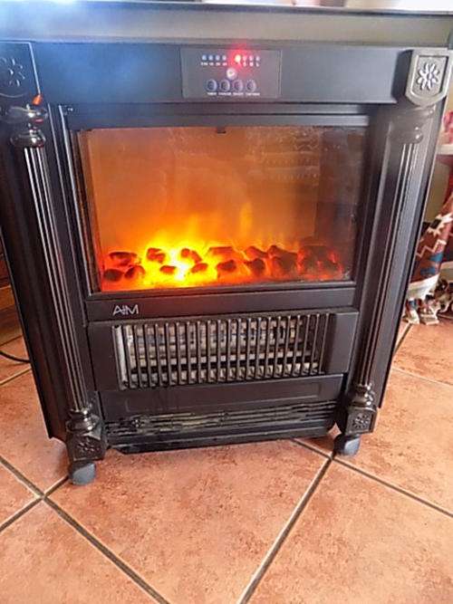 Large AIM Electric Bar Heater with Artificial Logs and Fire Effect