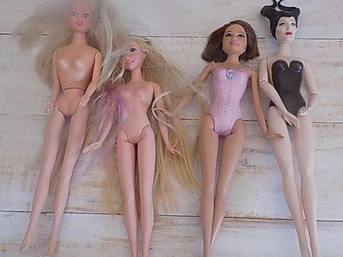 Four Dolls - Please see Description