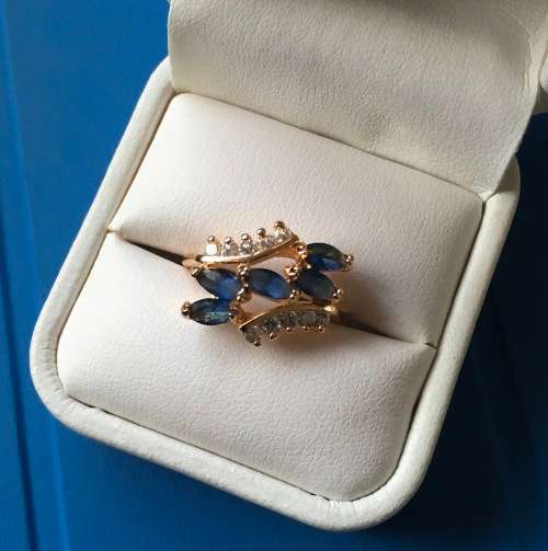 STUNNING RING WITH SIMULATED SAPPHIRE  STONES
