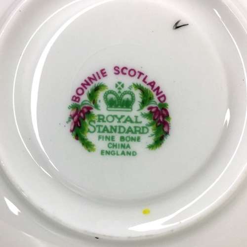 A SET OF FOUR ROYAL STANDARD FINE BONE CHINA TEA TRIOS  ` BONNIE SCOTLAND - MAC LEAN  `