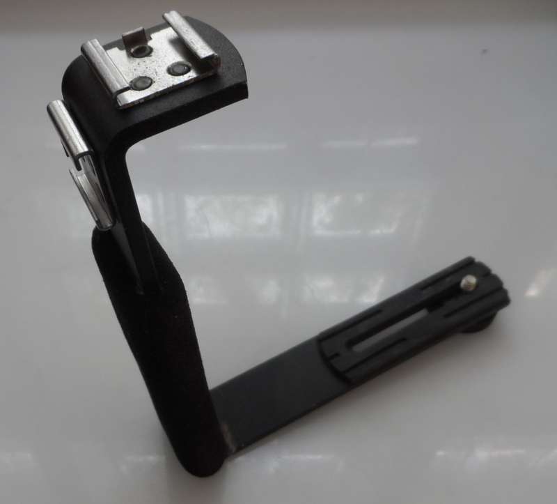 VINTAGE SLR CAMERA , HAND HELD FLASH MOUNT, & CABLE RELEASE  BRACKET    in very good condition