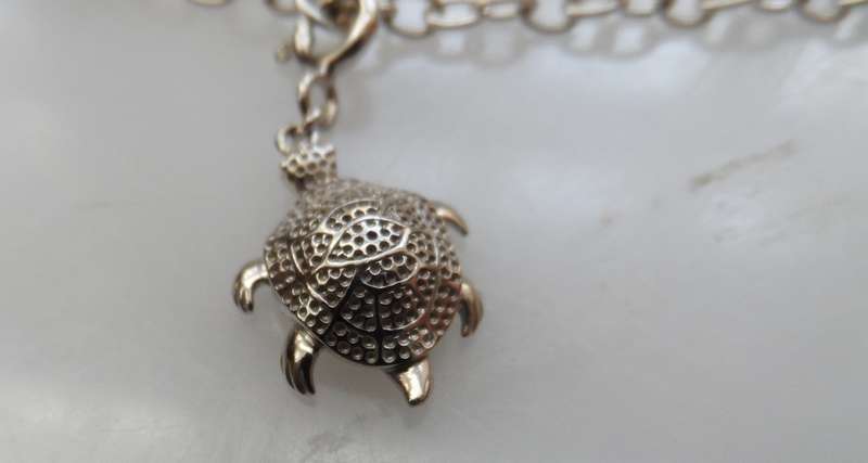 Silver charm bracelet ,turtle, sea horse, starfish,  & nautilus shell charms 800 mm / 31 ins length