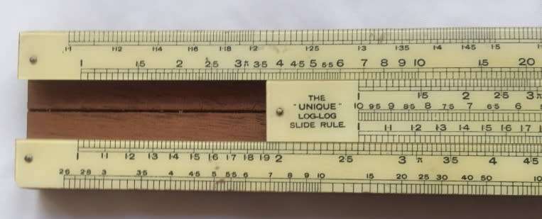 SLIDE RULE  THE `UNIQUE`  LOG TO LOG SLIDE RULE