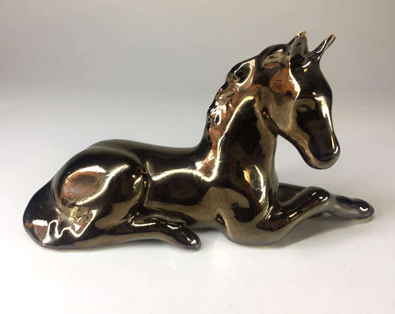 METALLIC -GLAZED  , PORCELAIN RECLINING HORSE FIGURINE