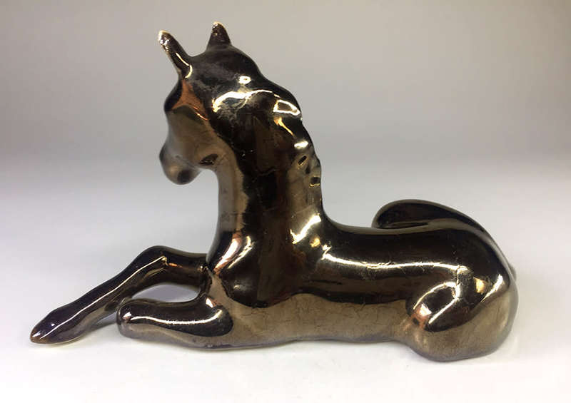 METALLIC -GLAZED  , PORCELAIN RECLINING HORSE FIGURINE