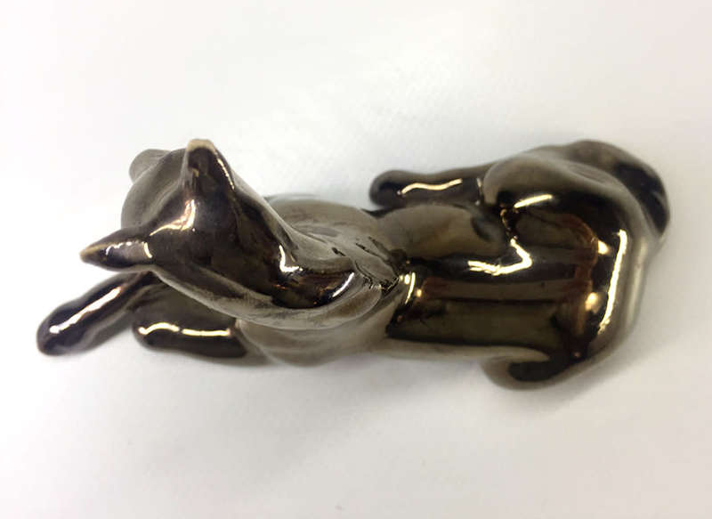 METALLIC -GLAZED  , PORCELAIN RECLINING HORSE FIGURINE