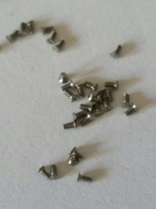Watch screws 0.7mm x 1.6mm estimated 1500 pices in a box -Watchmaker Treasures