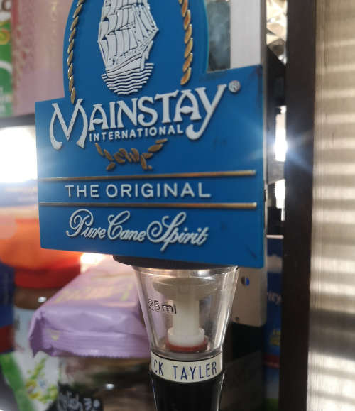 Vintage Mainstay Liquor optic with branding