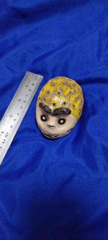 Ugly Paper weight or Ornament ! Must have Item! Very Distracting !