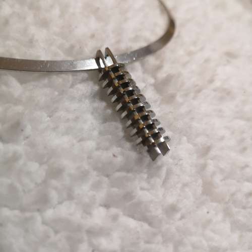 Avant-garde flat wire choker with pendant set. choker has a catch at the back